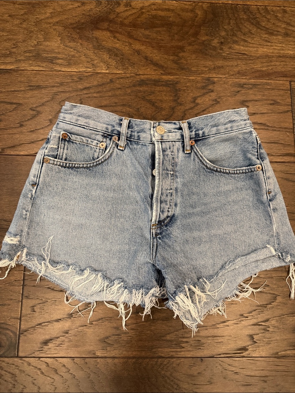 Agolde Light Blue Frayed Denim Cutoff Shorts
